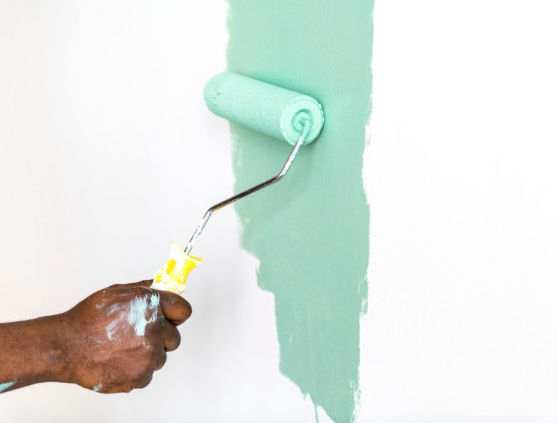 people-painting-house-wall
